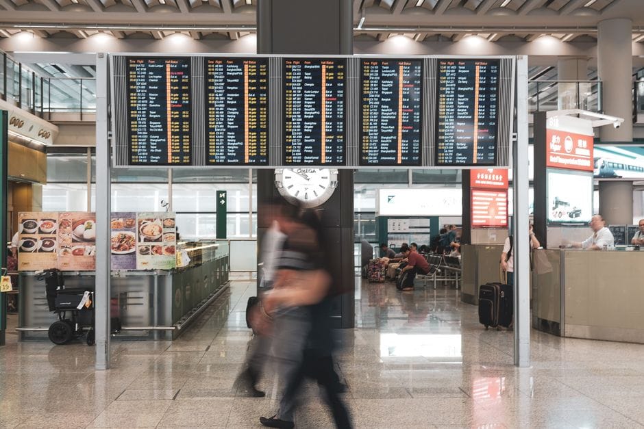 Passengers in a modern airport terminal, as Marrakech Menara's capacity rises to sixteen million